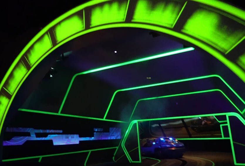 A car taking a turn at the EPCOT Test Track simulation