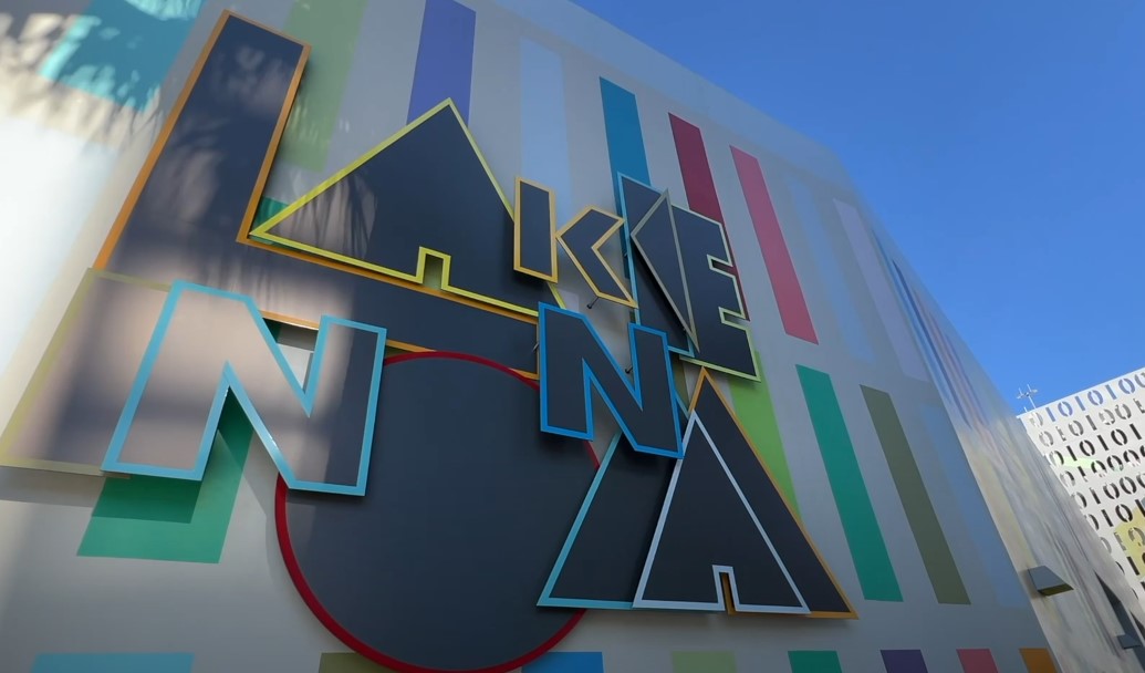 Vibrant letters spelling out "Lake Nona" adorn a colorful building facade