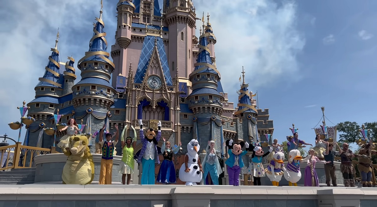 A lively performance in front of Cinderella Castle at Disney World, Orlando