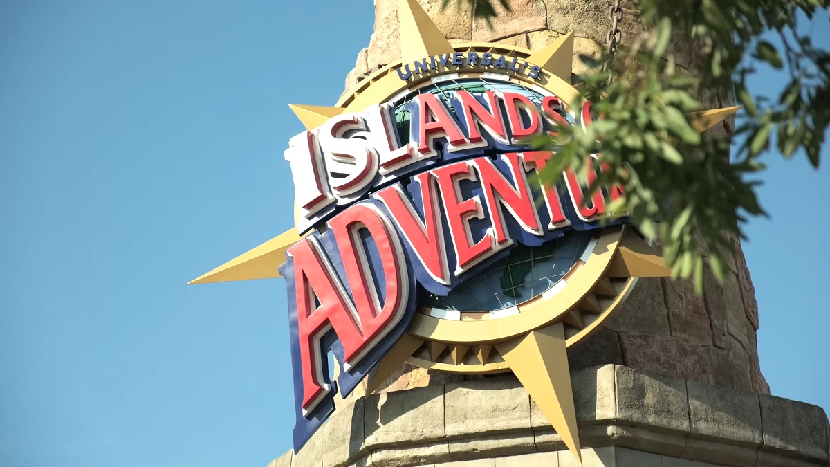 A close-up of the Universal’s Islands of Adventure theme park entrance sign