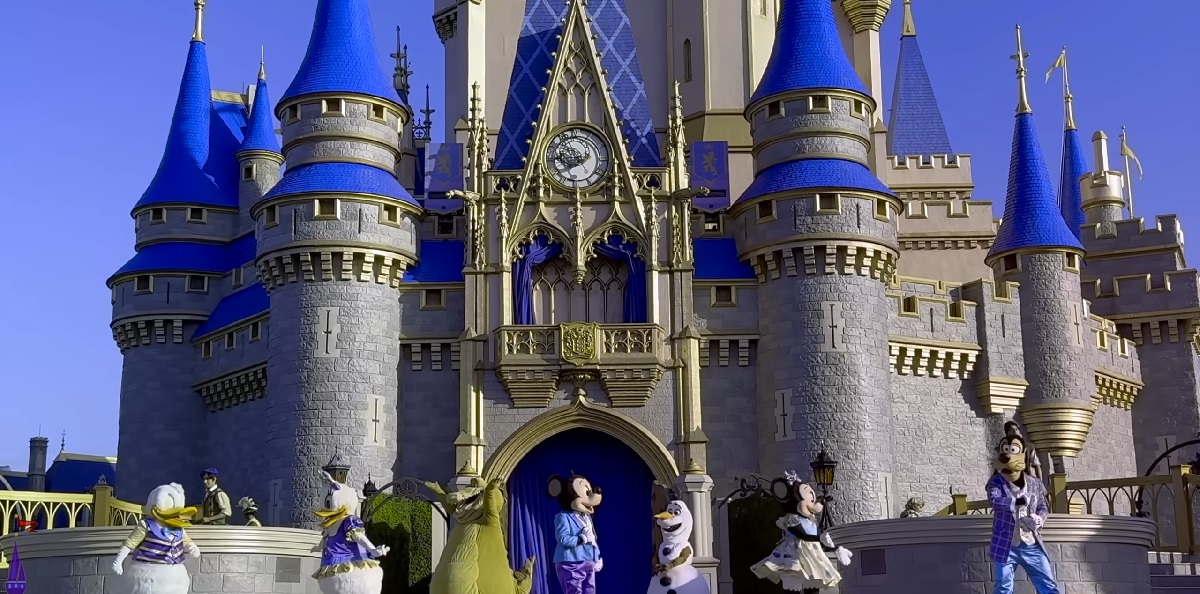 A vibrant daytime view of Cinderella Castle at Walt Disney World’s Magic Kingdom